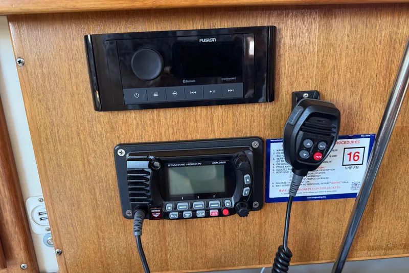 Slide: The Image of Control panel of a 1994 Catalina 320 sailboat with radio and audio equipment. - 45