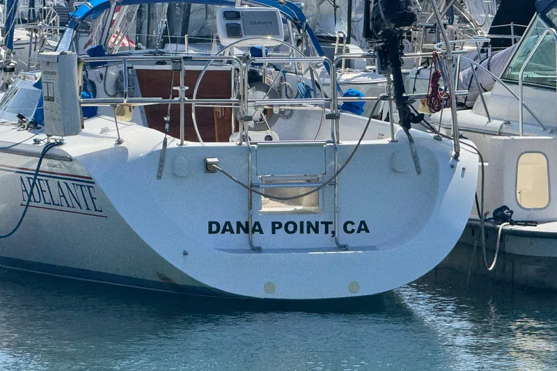 Slide: The Image of Catalina 320 sailboat docked at Dana Point, CA, rear view. - 49