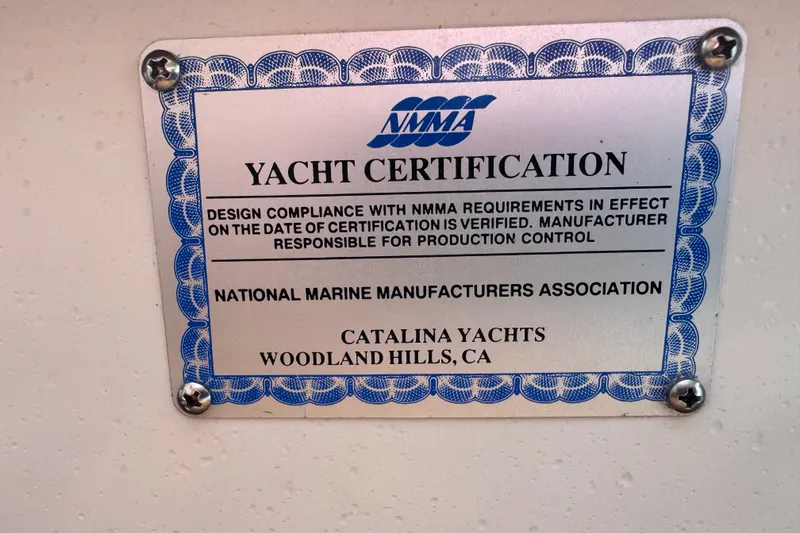 Slide: The Image of Yacht certification plaque for 1994 Catalina 320, NMMA compliance, Woodland Hills, CA. - 53