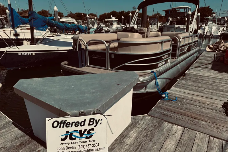 Slide: The Image of 2017 Sun Tracker Party Barge 22 DLX pontoon boat docked at marina. - 13