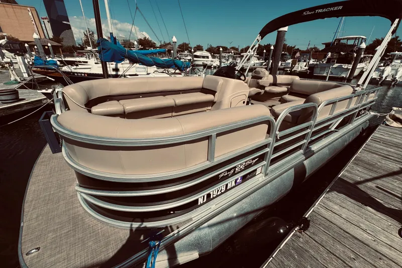 Slide: The Image of 2017 Sun Tracker Party Barge 22 DLX pontoon boat docked at marina. - 3