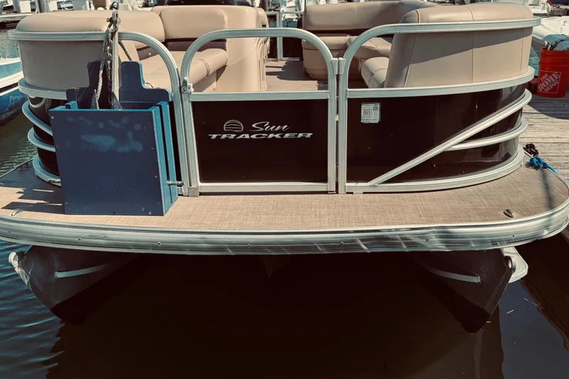 Slide: The Image of 2017 Sun Tracker Party Barge 22 DLX pontoon boat docked at marina. - 7