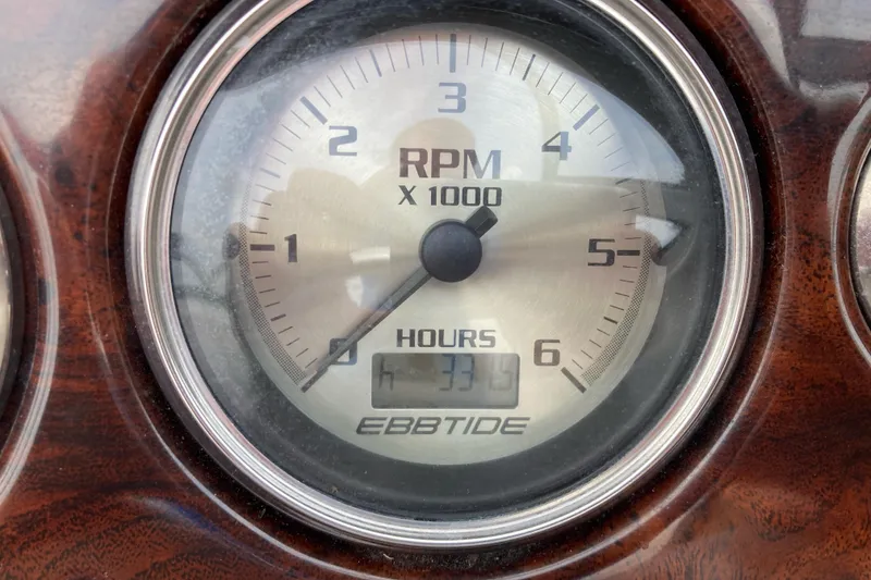 Slide: The Image of Tachometer of 2005 Ebbtide 2400 Fun Cruiser DC showing 331 hours. - 16