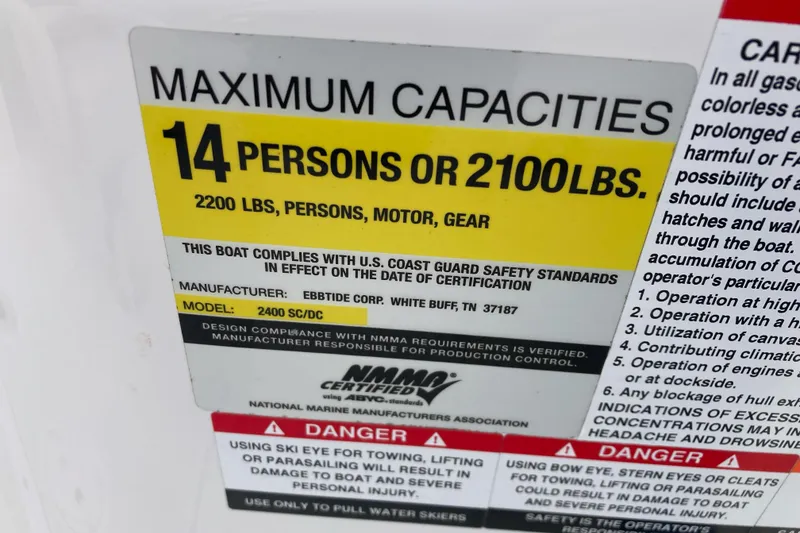Slide: The Image of Capacity label for 2005 Ebbtide 2400 Fun Cruiser DC, maximum 14 persons or 2100 lbs. - 18