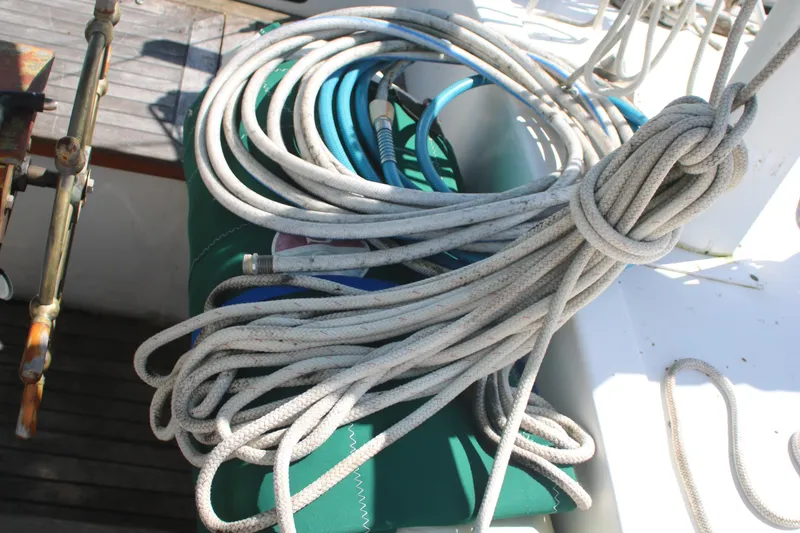 Slide: The Image of Coiled ropes on deck of 1981 Hardin 45 Voyager sailboat. - 14