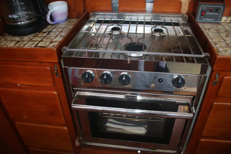 Slide: The Image of Stainless steel stove and oven in a 1981 Hardin 45 Voyager yacht kitchen. - 33