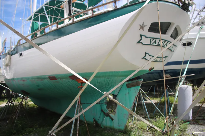 Slide: The Image of 1981 Hardin 45 Voyager sailboat, named Valhalla, on dry dock for maintenance. - 5
