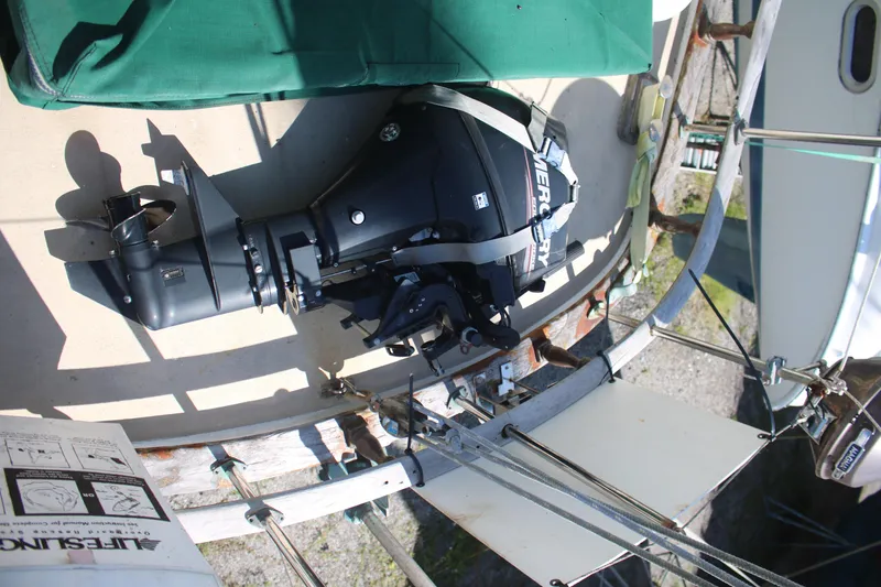 Slide: The Image of 1981 Hardin 45 Voyager sailboat with Mercury outboard motor on deck. - 9