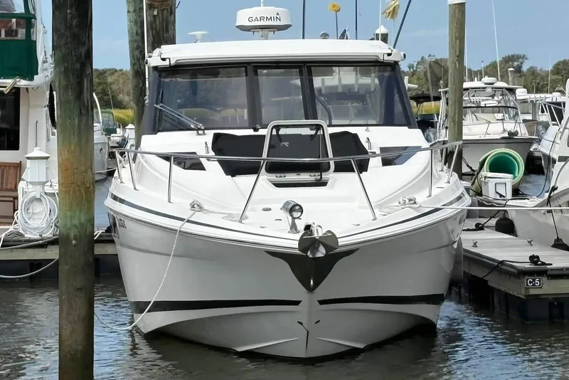 Slide: The Image of 2016 Regal 35 Sport Coupe docked at marina, front view. - 3