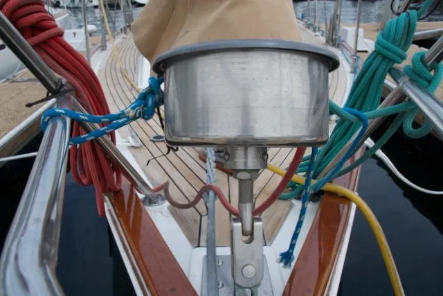 Slide: The Image of Sailboat deck with colorful ropes and metal fixture, Passport 42, 1986 model. - 11