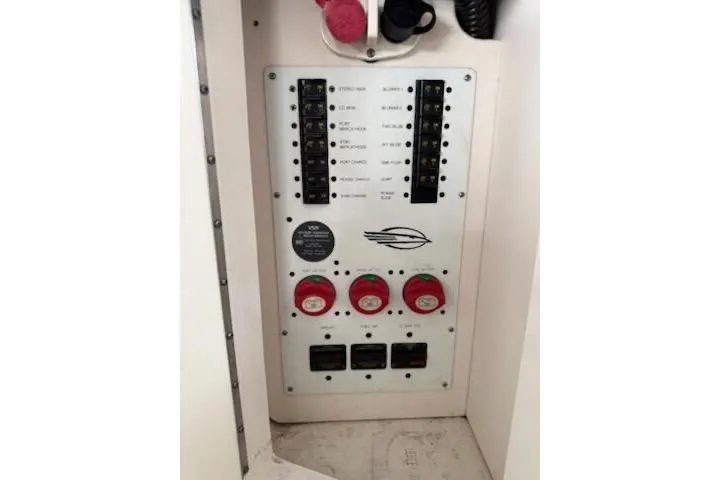 Slide: The Image of Cozy cabin interior of 2011 Chaparral 330 Signature with plush bedding and soft lighting. - 12