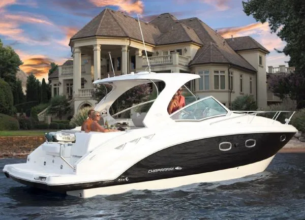 Slide: The Image of Interior of 2011 Chaparral 330 Signature boat with cozy cabin and kitchenette. - 14