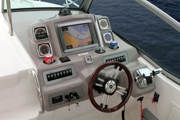 Slide: The Image of Engine room of 2011 Chaparral 330 Signature with Kohler generator and fire extinguisher. - 18