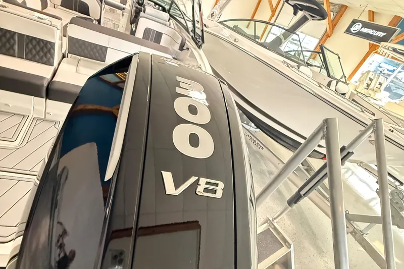 Slide: The Image of 2025 Monterey M-65 boat with 300 V8 engine in showroom. - 5