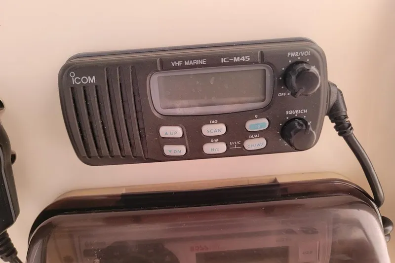 Slide: The Image of Boss audio system with Bluetooth and USB in 2001 Pursuit 2470 Center Console. - 20