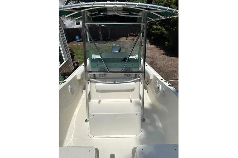Slide: The Image of 2001 Pursuit 2470 Center Console boat with T-top and spacious deck. - 24