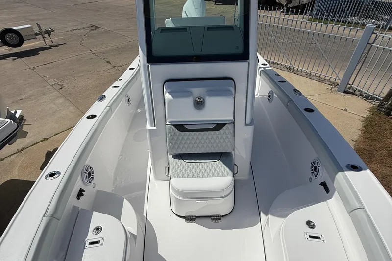Slide: The Image of 2026 Blackfin 242 HB boat interior with seating and storage compartments. - 17