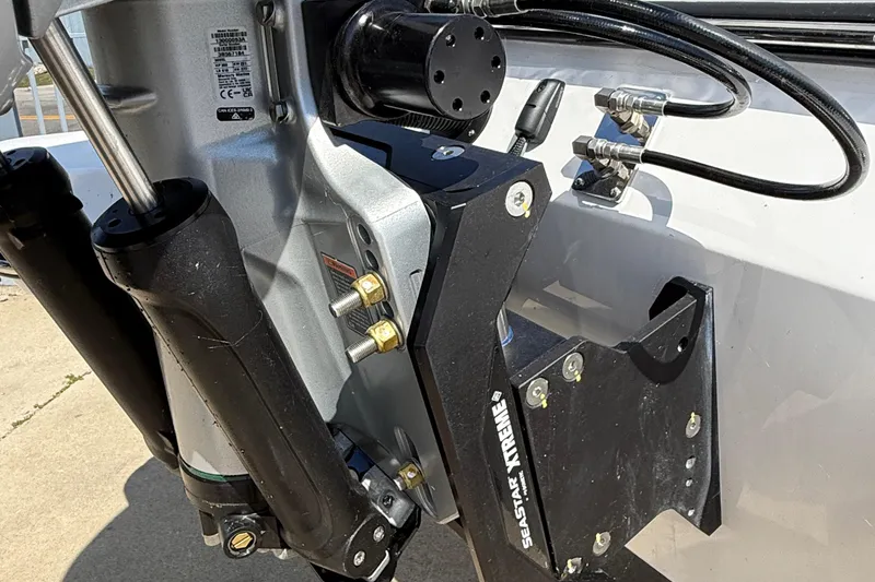 Slide: The Image of Close-up of 2026 Blackfin 242 HB boat engine components and hydraulic system. - 5