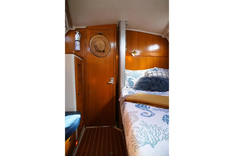 Slide: The Image of Cozy cabin interior of 2003 Catalina 42 MkII sailboat with nautical decor. - 26
