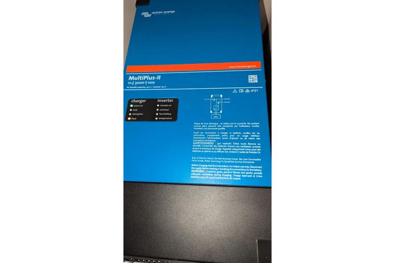 Slide: The Image of Victron Energy MultiPlus-II inverter charger, blue casing, model 12/3000/120-50, Catalina 42 MkII 2003. - 30