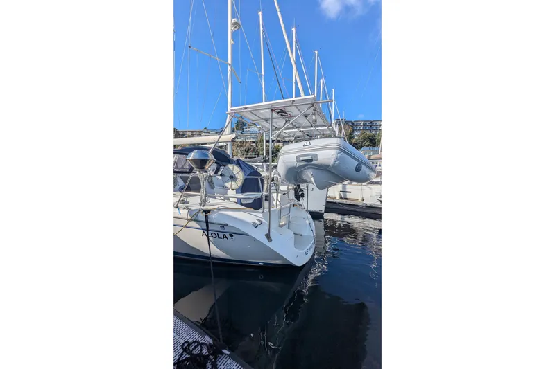Slide: The Image of Catalina 42 MkII sailboat, 2003 model, docked with inflatable dinghy on davits. - 6