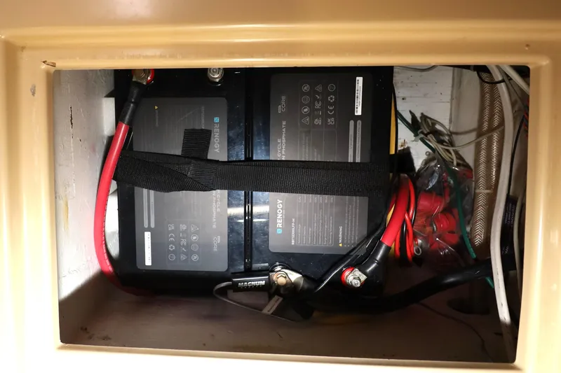 Slide: The Image of Battery compartment of a 1995 Island Packet 40 sailboat with Renogy batteries. - 30