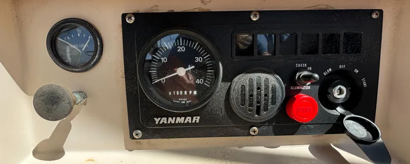 Slide: The Image of Control panel of a 1995 Island Packet 40 sailboat with Yanmar engine gauges. - 40