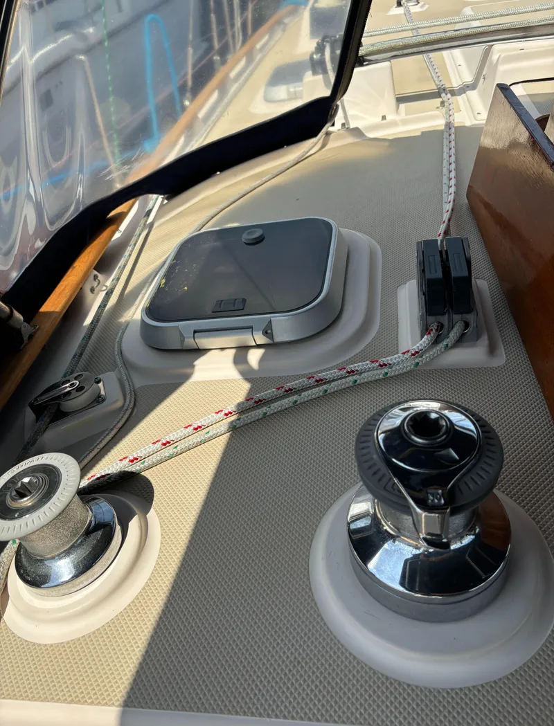 Slide: The Image of Deck of 1995 Island Packet 40 sailboat with winches and hatch. - 47