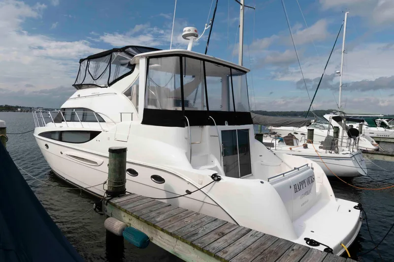 The Image of 2007 Meridian 459 Motoryacht docked at marina under blue sky. - 0