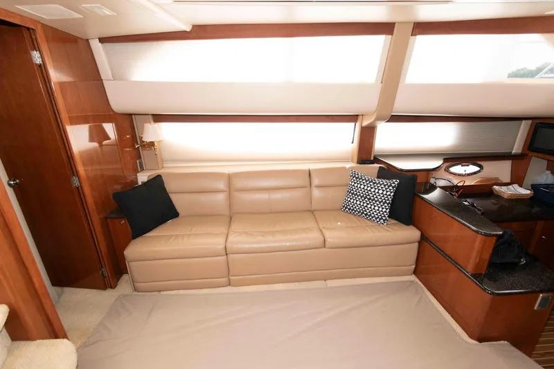 Slide: The Image of Luxurious interior of 2007 Meridian 459 Motoryacht with beige leather sofa and stylish decor. - 13