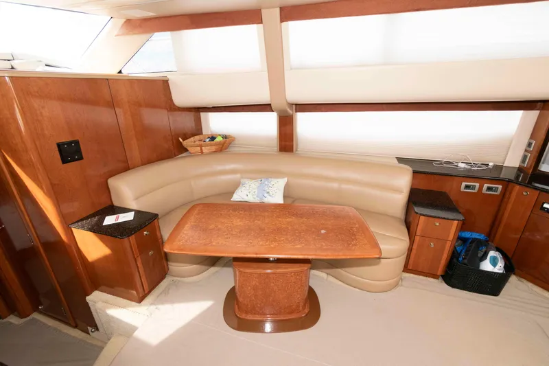Slide: The Image of Luxurious interior of 2007 Meridian 459 Motoryacht with leather seating and wooden table. - 14