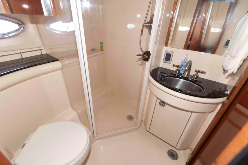 Slide: The Image of Luxurious bathroom in 2007 Meridian 459 Motoryacht with shower, sink, and toilet. - 21