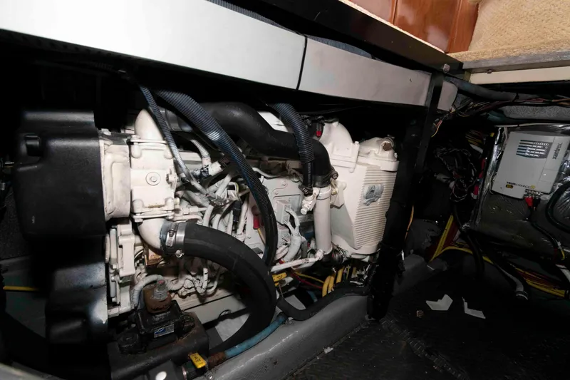 Slide: The Image of Engine room of 2007 Meridian 459 Motoryacht, showcasing mechanical components and wiring. - 24