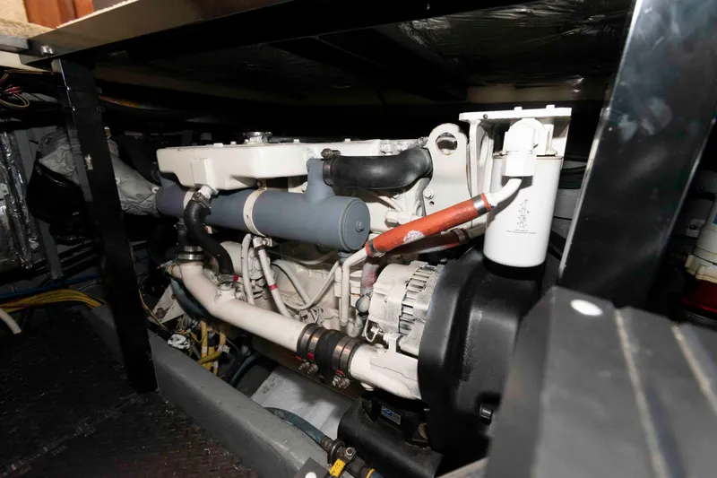 Slide: The Image of Engine room of 2007 Meridian 459 Motoryacht, showcasing detailed mechanical components. - 25