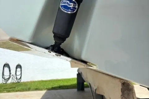 Slide: The Image of 2018 Century 2600 Center Console boat with Bennett trim tab actuator. - 12