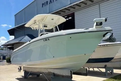 Slide: The Image of 2018 Century 2600 Center Console boat on display outside a warehouse. - 18