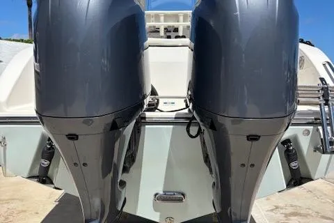 Slide: The Image of 2018 Century 2600 Center Console with dual outboard motors, rear view. - 23