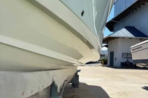 Slide: The Image of 2018 Century 2600 Center Console boat on dry dock, side view. - 26