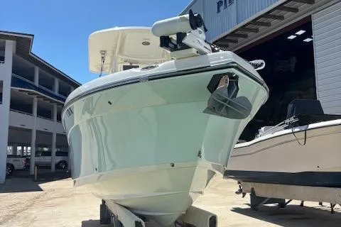 Slide: The Image of 2018 Century 2600 Center Console boat docked at a marina. - 28