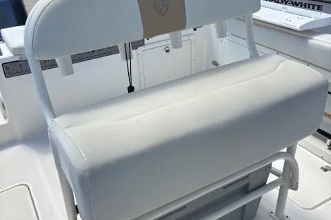 Slide: The Image of 2018 Century 2600 Center Console boat seat, white upholstery, sturdy design. - 6