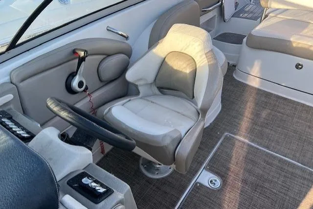 Slide: The Image of 2018 Crownline Eclipse E23 XS boat interior with steering wheel and seating. - 5