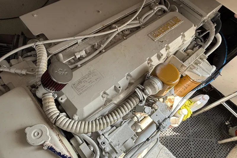 Slide: The Image of Engine compartment of a 1999 Ocean Yachts 40 Express with Caterpillar engine. - 3