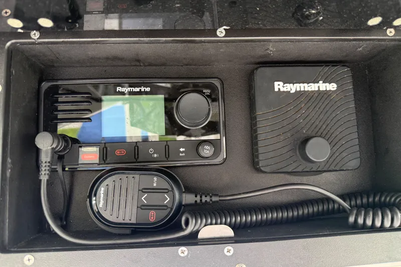 Slide: The Image of Raymarine marine radio system in a 2020 Caymas 341 CC boat console. - 17