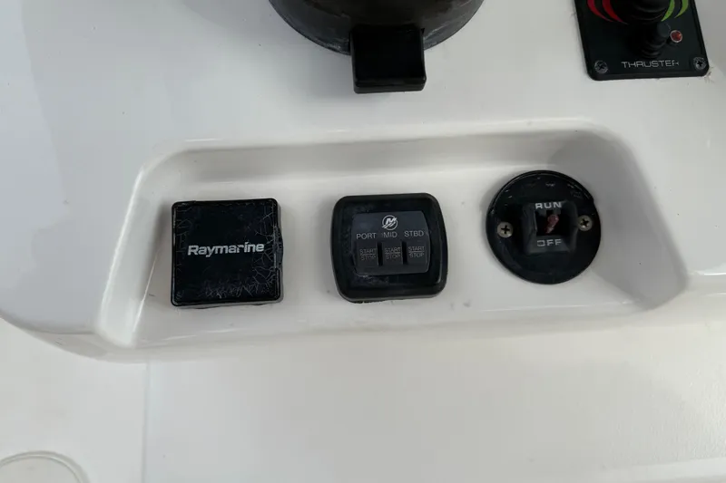 Slide: The Image of Control panel of 2020 Caymas 341 CC boat with Raymarine equipment. - 19