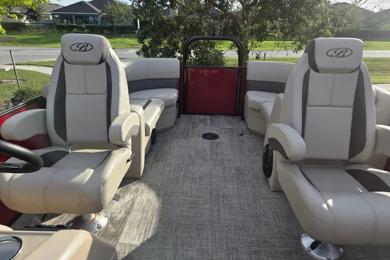 Slide: The Image of 2026 Bentley Pontoons Fish 203 interior with luxurious seating and modern design. - 16