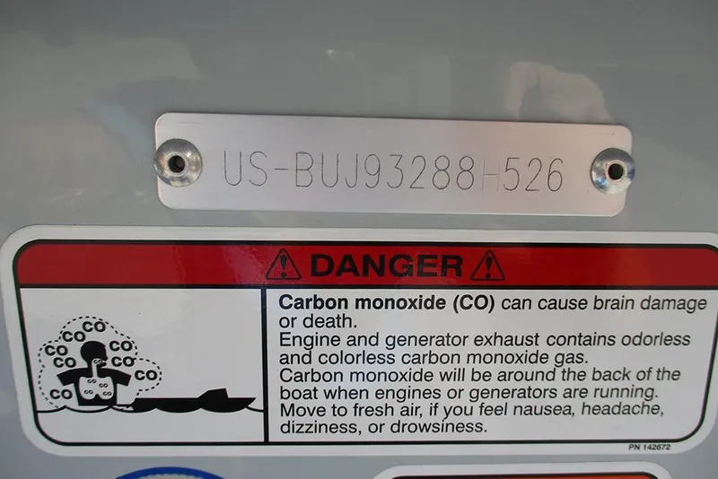 Slide: The Image of VIN plate and carbon monoxide warning on 2026 Mako Pro Skiff 15 CC boat. - 22