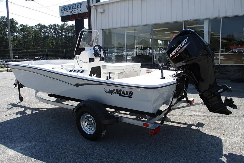 Slide: The Image of 2026 Mako Pro Skiff 15 CC boat with Mercury engine on trailer. - 7