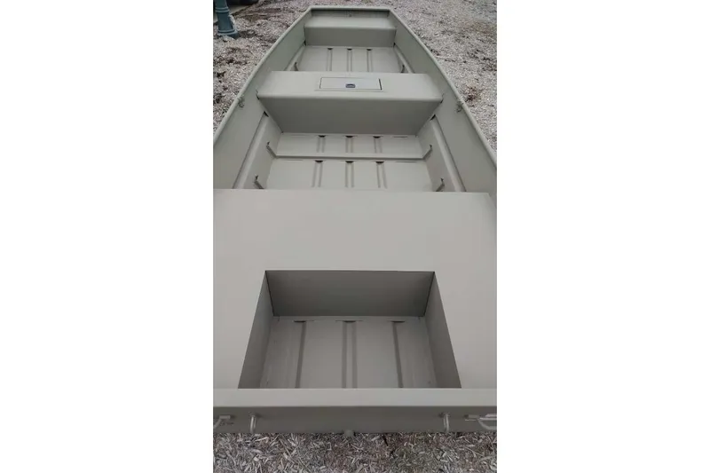 Slide: The Image of 2026 Tracker Grizzly 15 Jon boat, interior view, showcasing seating and storage. - 20