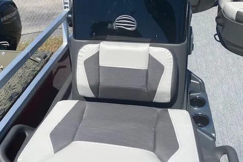 Slide: The Image of 2026 Sun Tracker Bass Buggy 18 DLX boat seat with modern design and cup holders. - 3