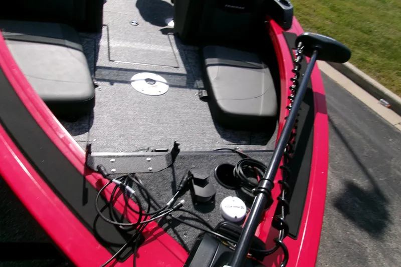 Slide: The Image of 2026 Tracker Targa V-19 Combo boat interior with seats and equipment. - 4